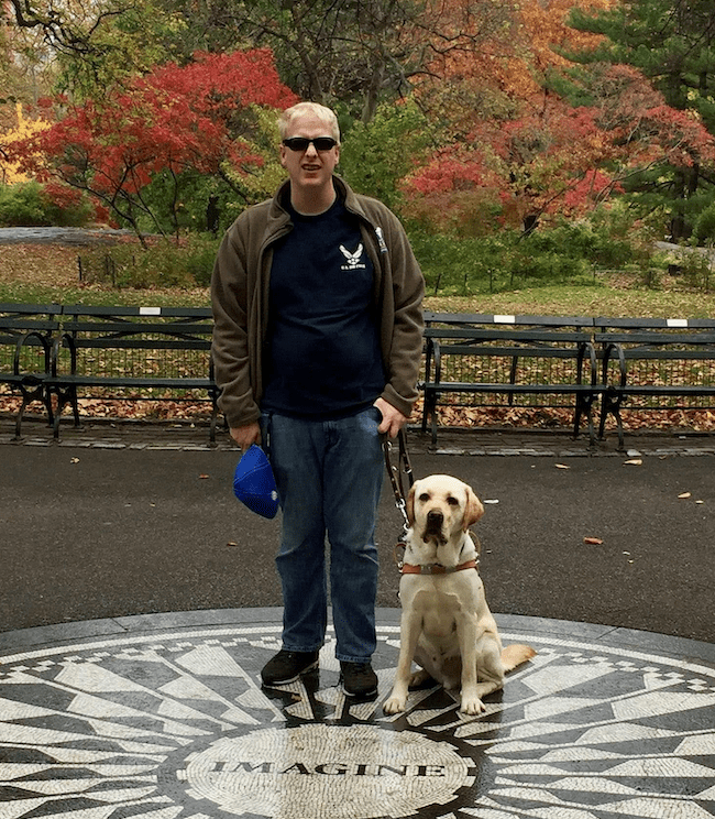 Photo of Sr. Orientation and Mobility Specialist Bill Adams and his guide dog.